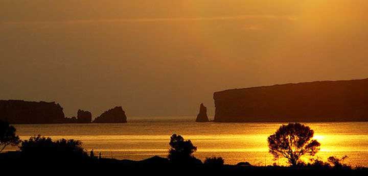 sunset cruise Greece sailboat